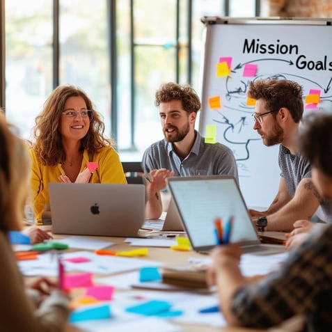 The image features a bright, inviting conference room filled with diverse individuals engaged in a collaborative brainstorming session